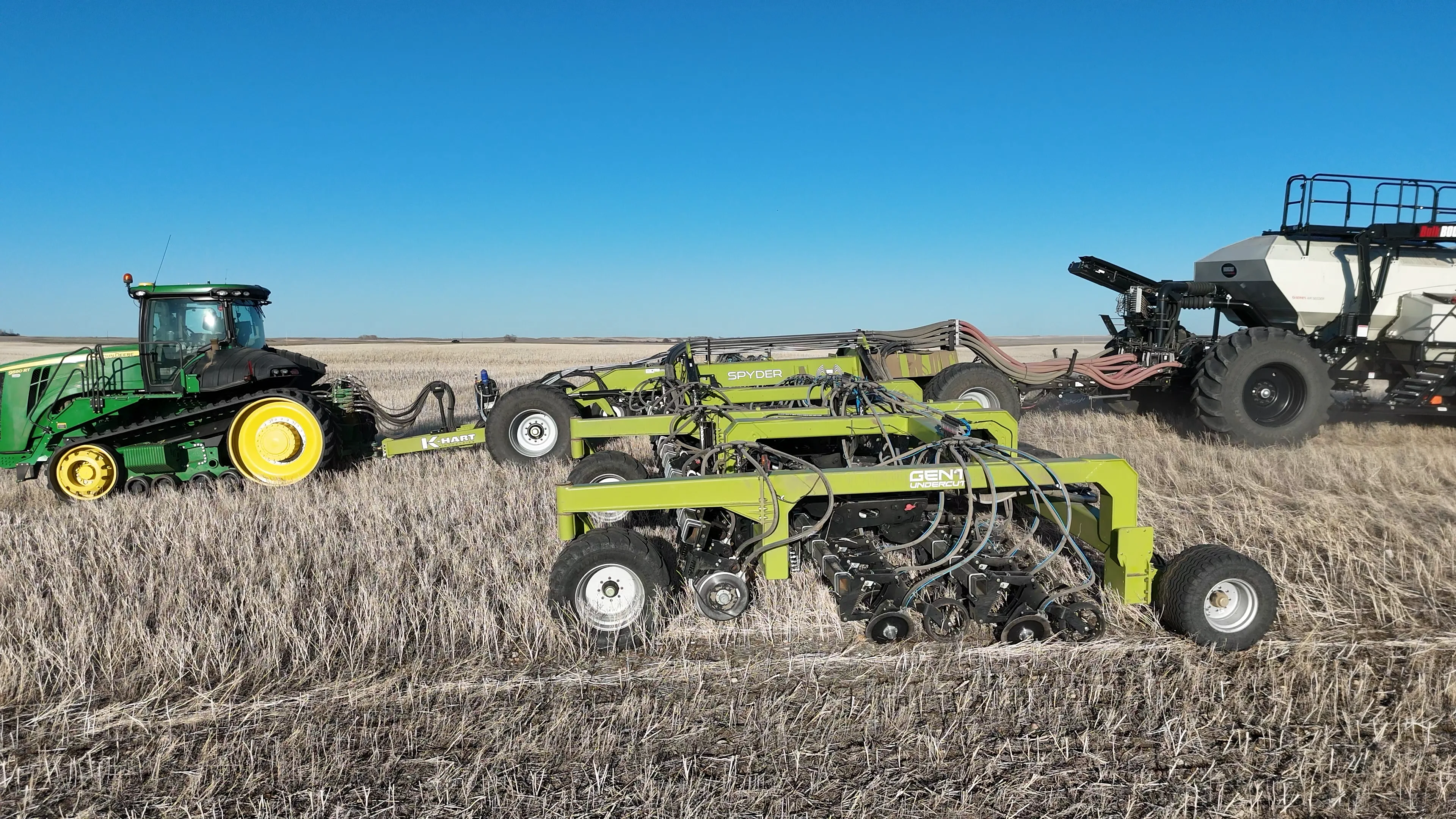 Spyder disc drill moving through heavy residue in field