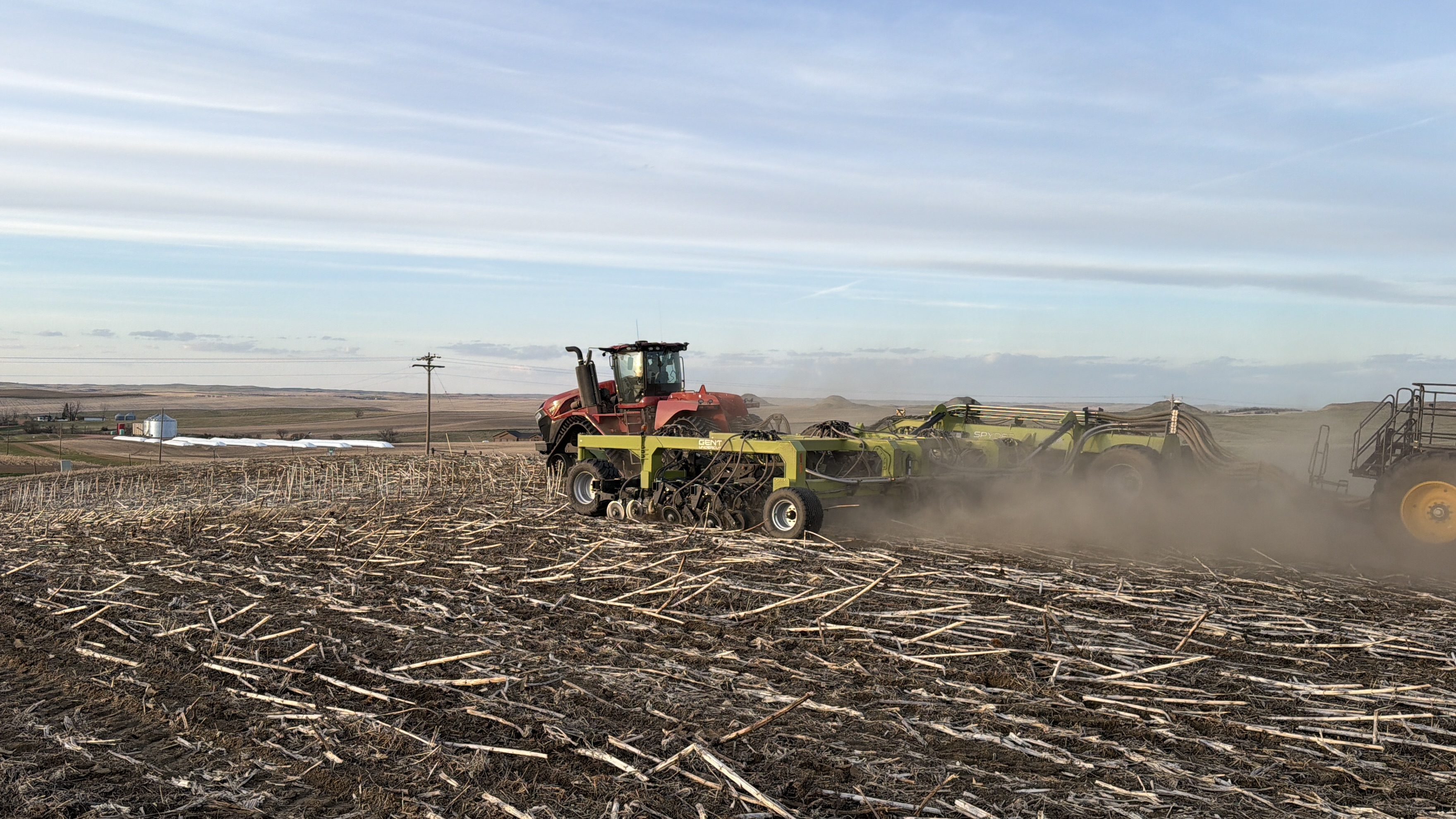 Spyder disc drill moving through heavy residue in field